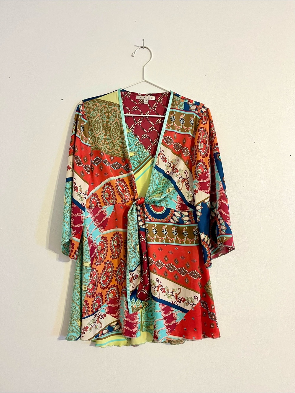 Colorful flowy tie-front blouse